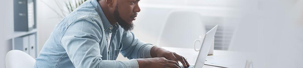 Man using a laptop.